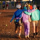 Festival-goers leaving at the end of the Glastonbury Festival at Worthy Farm in Somerset. Ben Birchall/PA Wire