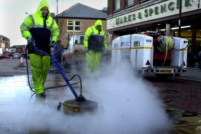Operatives Paul Dean, left, and John Windmill using a 'Grimebuster' machine in Carlton Street, Castleford. Story Louise Male, pictured on February 26, 2002.
