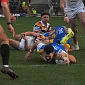 Cameron Smith scores for Leeds Rhinos in his testimonial game against Bradford Bulls. Picture by Steve Riding.