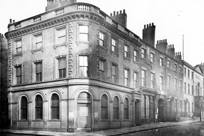 Albion Street at the junction with Bond Street in 1882. The gated entrances to the Yorkshire Post offices are on the right.