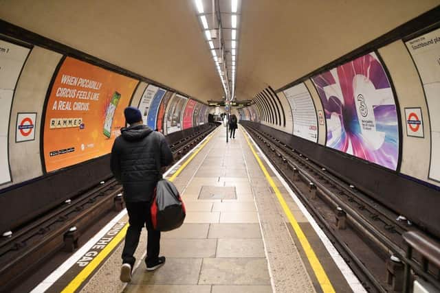 Few commuters wait on the platform during the rush hour at Clapham Common in London (Photo: JUSTIN TALLIS/AFP via Getty Images)