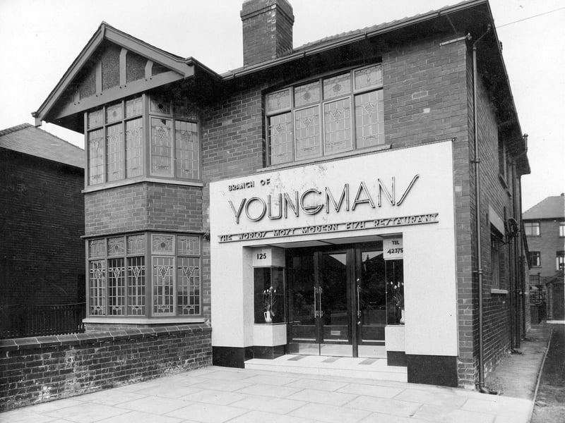 Youngman's fish and chip shop on Easterly Road in April 1936. The sign over the door reads 'Branch of Youngmans the Worlds Most Modern Fish Restaurant'.