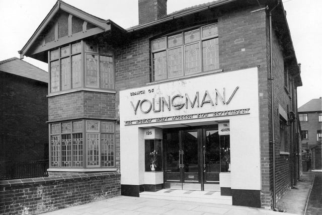 Youngman's fish and chip shop on Easterly Road in April 1936. The sign over the door reads 'Branch of Youngmans the Worlds Most Modern Fish Restaurant'.