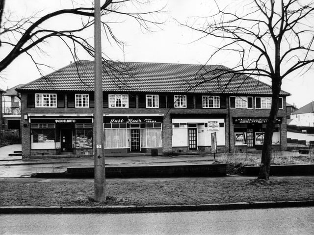 Shops on Gledhow Valley Road pictured in March 1982. They include Modelauto and Just Hair.