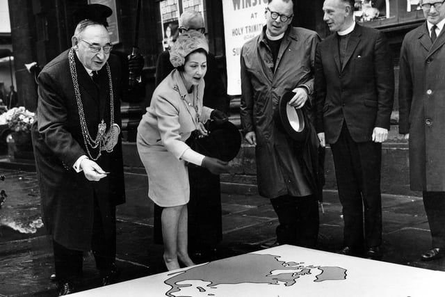 The Lord Mayor of Leeds, Alderman Joshua S. Walsh, and his wife, the Lady Mayoress, attend the opening of Christian Aid Week at the Holy Trinity Church on Boar Lane in May 1967.