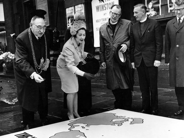 The Lord Mayor of Leeds, Alderman Joshua S. Walsh, and his wife, the Lady Mayoress, attend the opening of Christian Aid Week at the Holy Trinity Church on Boar Lane in May 1967.