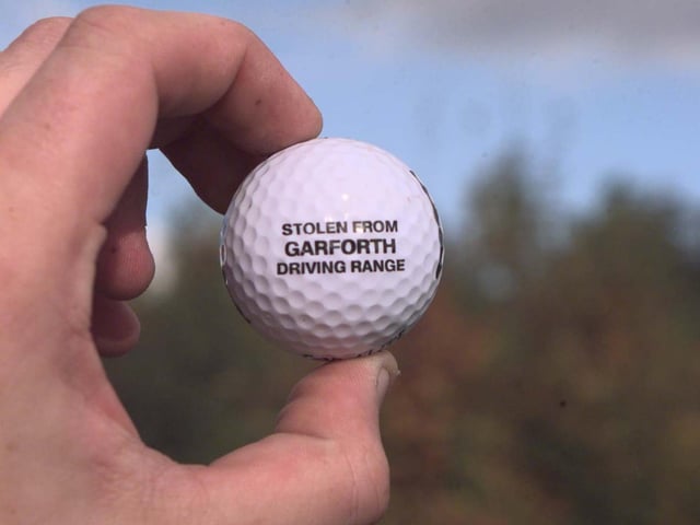 A golf ball from Garforth Golf Range where 3,000 were stolen by thieves in October 1998. Each ball had 'stolen from Garforth Driving Range' printed on them.
