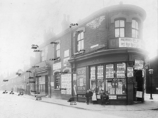Numbers 2/4 at the junction with Church Street, business of William Cussons Ltd grocers. The shop is covered with posters, some advising that the business is to move to 264 Hunslet Road. The others note goods in stock, including tea, flour, butter, cheese, ham, eggs, bacon, Bovril, HP sauce. Children in front of window in period dress. Pictured in August 1904.