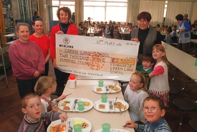 Friends of Garforth Green Lane School - Sharon Dixon, Julie Boothroyd & Pam Taylor - presented a cheque for £2,500 to head teacher Anita Davis in May 1996. They are pictured with pupils Daniel Naylor and Alex Chandler.