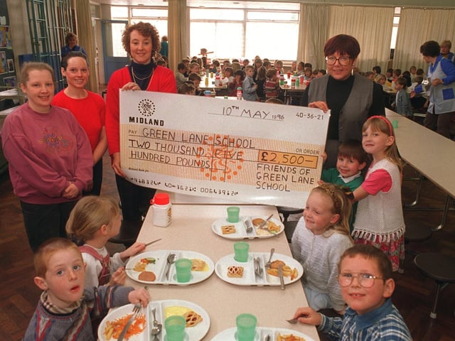 Friends of Garforth Green Lane School - Sharon Dixon, Julie Boothroyd & Pam Taylor - presented a cheque for £2,500 to head teacher Anita Davis in May 1996. They are pictured with pupils Daniel Naylor and Alex Chandler.