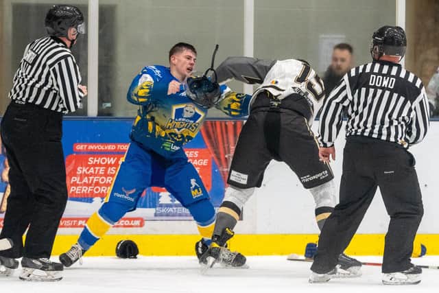 TEAM PLAYER: Jordan Griffin gets to grips with Milton Keynes Lightning's Leigh Jamieson last season. Picture courtesy of Oliver Portamento