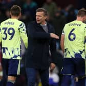 BAD DAY: For Leeds United boss Jesse Marsch, centre, pictured consoling his players after Friday night's 2-1 defeat at Aston Villa. 
Photo by GEOFF CADDICK/AFP via Getty Images.