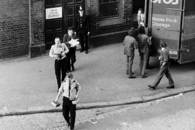 Removal men clear out the old Millgarth Police Station in January 1976 and move files and furniture into the new home.