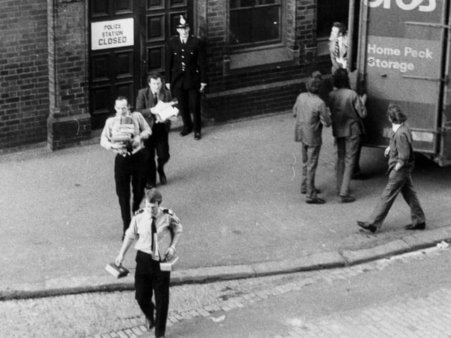 Removal men clear out the old Millgarth Police Station in January 1976 and move files and furniture into the new home.