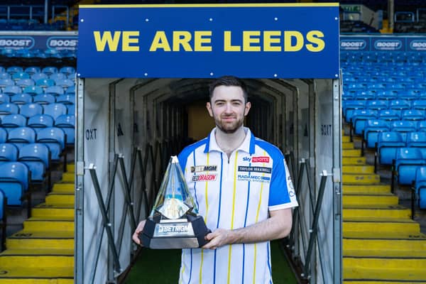 World darts champion Luke Humphries took the Premier League trophy to Elland Road ahead of Thursday night's  event at FD Arena. Picture by Dan Richardson/Leeds United/PDC