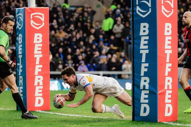 Brodie Croft touches down for Leeds Rhinos against Warrington Wolves to maintain his record of scoring in every Super League game he has played this year. Picture by Alex Whitehead/SWpix.com.