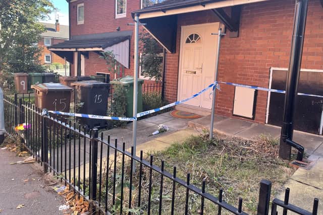 A woman and a child were found dead inside the flat.