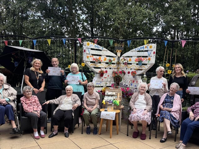 Colleagues and residents at HC-One’s Snapethorpe Hall Care Home with their gardening hamper prizes