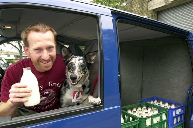 Wetherby milkman Drew Ramsay, took his dog, Molly, to work delivering milk during the annual Blue Cross organised Take Your Dog to Work Day in September 2002.