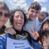 Marisa was cheered on by her four sons as she made the 14,000ft jump to raise money for cancer research