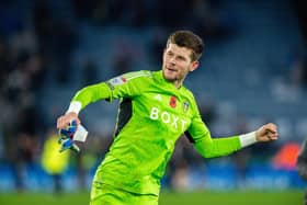WHITES UNITY: Hailed by Leeds United keeper Illan Meslier as the Frenchman celebrates Friday night's 1-0 victory at Championship leaders Leicester City in which he played a pivotal role. Picture by Bruce Rollinson.