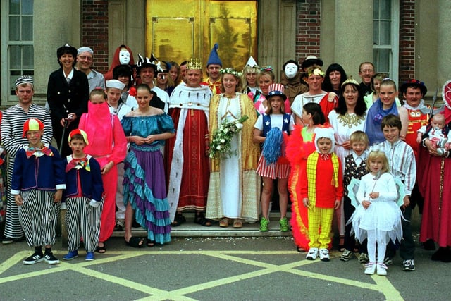 Sweethearts Kerry Bingham and Graham Cousins ditched the traditional white church wedding in May 1999 in favour of a fancy dress occasion at the local register office in Bridlington. The couple are pictured with the guests outside the register office.