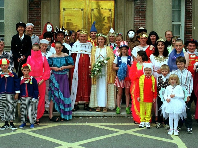 Sweethearts Kerry Bingham and Graham Cousins ditched the traditional white church wedding in May 1999 in favour of a fancy dress occasion at the local register office in Bridlington. The couple are pictured with the guests outside the register office.