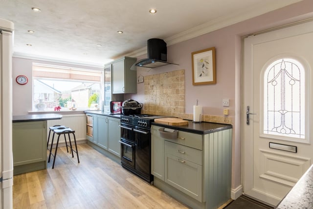 Decorated in neutral tones with lots of worktop space and a breakfast bar, the kitchen is a great space for any budding chef.