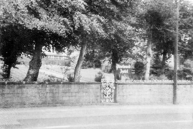 The entrance gate and boundary wall of the Pinewood Hotel on Potternewton Lane in Chapel Allerton in July 1979.