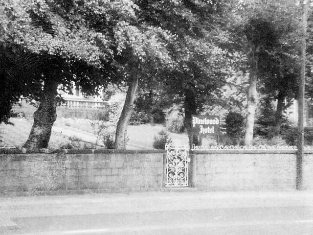 The entrance gate and boundary wall of the Pinewood Hotel on Potternewton Lane in Chapel Allerton in July 1979.