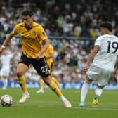 CHIEF THREAT: Recently returned Leeds United top scorer Rodrigo, right, as the Whites take on Wolves and Max Kilman, left. Photo by David Rogers/Getty Images.