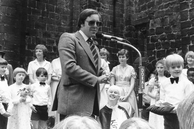 TV presenter Richard Whiteley judging the Carnival Queen competition at the first Kirkstall Festival in 1981.