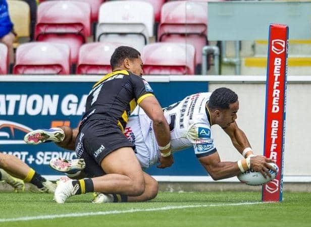Jason Qareqare scores for Castleford Tigers against York Knights. Picture by Tony Johnson.