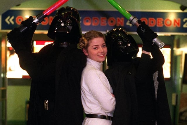 Star Wars trilogy opens at the Odeon cinema, Leeds city centre, with dressed up staff, from left, Steve Jacklin, as Darth Vader 1, Samantha Murphy, as Princess Leia, and Stephanie Lennon, as Darth Vader 2.