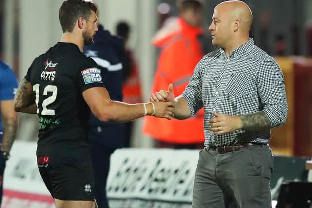 Danny Ward shakes hands with Jay Pitts at the end of a game against Hull KR. (Photo: Allan McKenzie/SWpix.com)