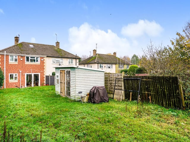 Patio doors in the living and dining space provide access to the suntrap garden to the rear.