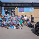 Recovery Runners and Come Outside members outside Reynolds Boxing Club