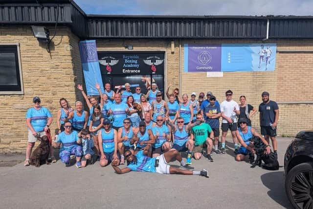 Recovery Runners and Come Outside members outside Reynolds Boxing Club