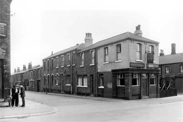 On the left is Brancepeth Place, a street of back-to-back terraced houses and industrial buildings, on the right. At the corner is number 2 Brancepeth Place, the Albert Inn supported by Hammonds Tower Ales. Just visible on the far right is Brancepeth Street. Pictured in August 1958.