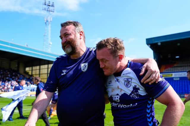 Coach Paul Cooke and player Will Jubb celebrate Featherstone Rovers' 1895 Cup semi-final win at Oldham last month. Picture by Olly Hassell/SWpix.com.