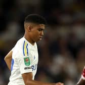 Leeds United's Cody Drameh (left) and Shrewsbury Town's Oluwatunmise Sobowale in action during the Carabao Cup first round match at Elland Road, Leeds. Picture date: Wednesday August 9, 2023. PA Photo. See PA story SOCCER Leeds. (Photo credit should read: Nigel French/PA Wire)