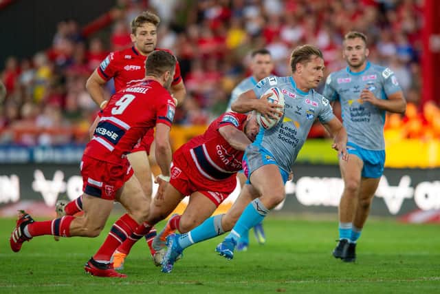 Brad Dwyer on his way to scoring the Rhinos first try. Picture by Bruce Rollinson.