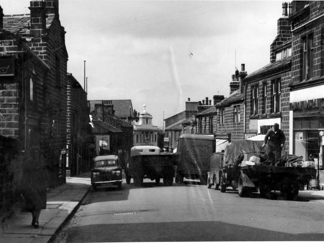 A 1950s view of Yeadon High Street, busy with delivery vehicles. The ornate white building in the centre was originally Yeadon Picture House which opened on Monday, August 3, 1925, with a showing of 'The Man Who Came Back' starring George O'Brian and Dorothy MacKaill. The silent film was accompanied by orchestral music by the Melody Quartet. Seat prices at that time were 4d and 6d in the arena and 9d on the balcony. It survived for many years as a cinema before becoming a Bingo Hall, before the building housed The Aviator pub.