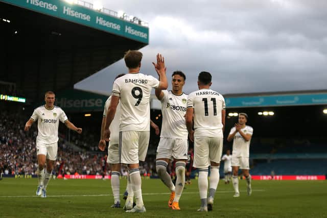 CHALLENGE: For the likes of Leeds United's record signing Rodrigo, centre, and Jack Harrison, right, to weigh in with more goals and stop the Whites being so reliant on striker Patrick Bamford, left, pictured after netting in last weekend's 6-2 pre-season victory against Cagliari at Elland Road. Photo by Ashley Allen/Getty Images.