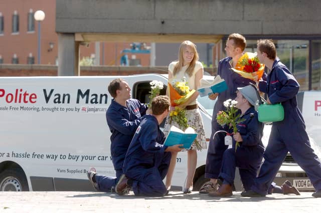 A campaign launched in Leeds city centre by 'Polite Van Man'. Pictured is Zoe Weston, 22, from Headingley, Leeds, surrounded by nice van drivers, on August 6, 2004.