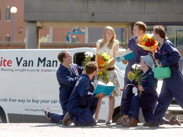 A campaign launched in Leeds city centre by 'Polite Van Man'. Pictured is Zoe Weston, 22, from Headingley, Leeds, surrounded by nice van drivers, on August 6, 2004.
