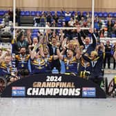 Leeds Rhinos players celebrate with the trophy following last year's Betfred Wheelchair Super League Grand Final win against Halifax Panthers. Picture by John Clifton/SWpix.com.