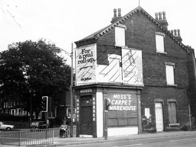 Moss's Carpet Warehouse on the corner of Roundhay Road and Bayswater Road, the latter road in the foreground of the picture. A row of terraced houses on Spencer Place can be seen going off to the left. Pictured in July 1980.