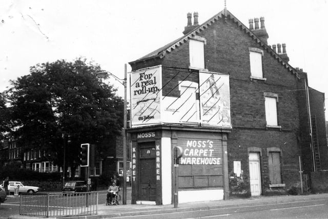 Moss's Carpet Warehouse on the corner of Roundhay Road and Bayswater Road, the latter road in the foreground of the picture. A row of terraced houses on Spencer Place can be seen going off to the left. Pictured in July 1980.