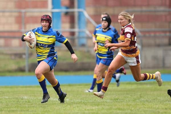 Emily Fitzpatrick in action for Oulton Raidettes against Huddersfield Giants in a recent women's nines tournament in Warrington. Picture by John Clifton/SWpix.com.